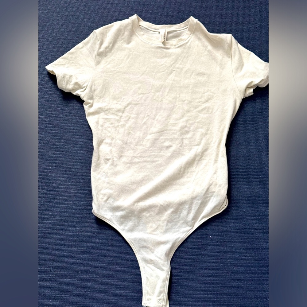 Skims Bodysuit in Cream